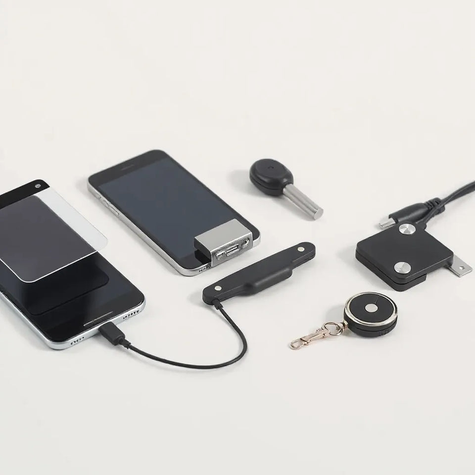 Smartphone with privacy screen, anti-theft cable lock, and secure mounting accessories on a clean desk