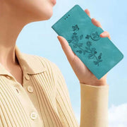 For iPhone 16e Flower Butterfly Embossing Pattern Leather Phone Case(Sky Blue)
