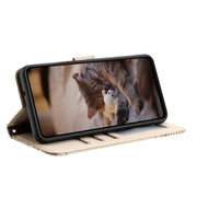 For iPhone 16 Plus Cat Embossing Pattern Leather Phone Case with Lanyard(Beige)
