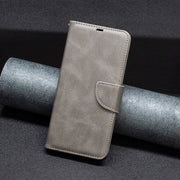 For iPhone 16 Lambskin Texture Pure Color Flip Leather Phone Case(Grey)