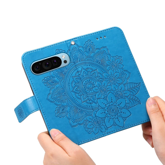 For Google Pixel 9 7-petal Flowers Embossing Leather Phone Case(Blue)