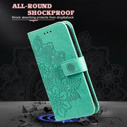 For Google Pixel 9 Seven-petal Flowers Embossing Leather Phone Case(Green)