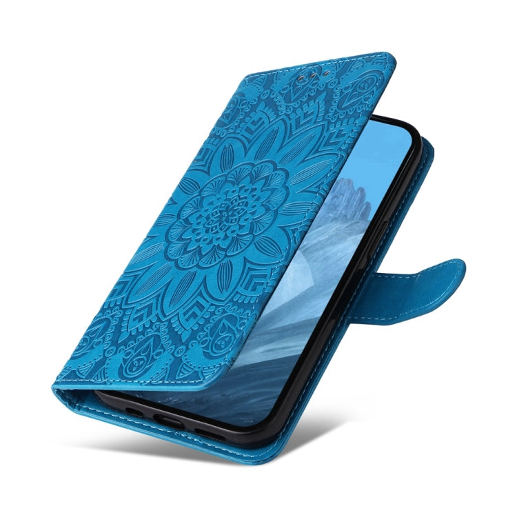 For Google Pixel 9 Embossed Sunflower Leather Phone Case(Blue)