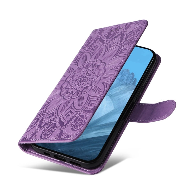 For Google Pixel 9 Embossed Sunflower Leather Phone Case(Purple)