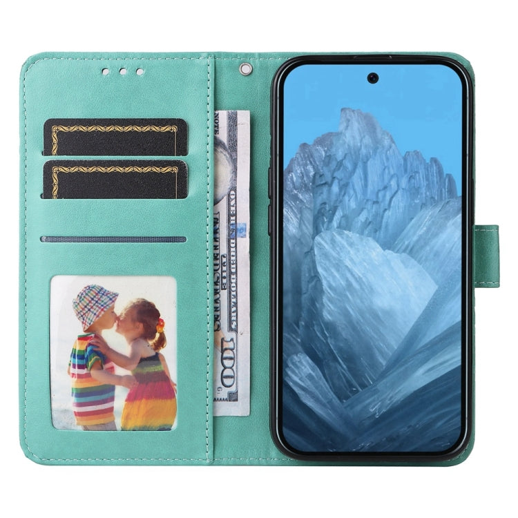 For Google Pixel 9 Embossed Sunflower Leather Phone Case(Green)
