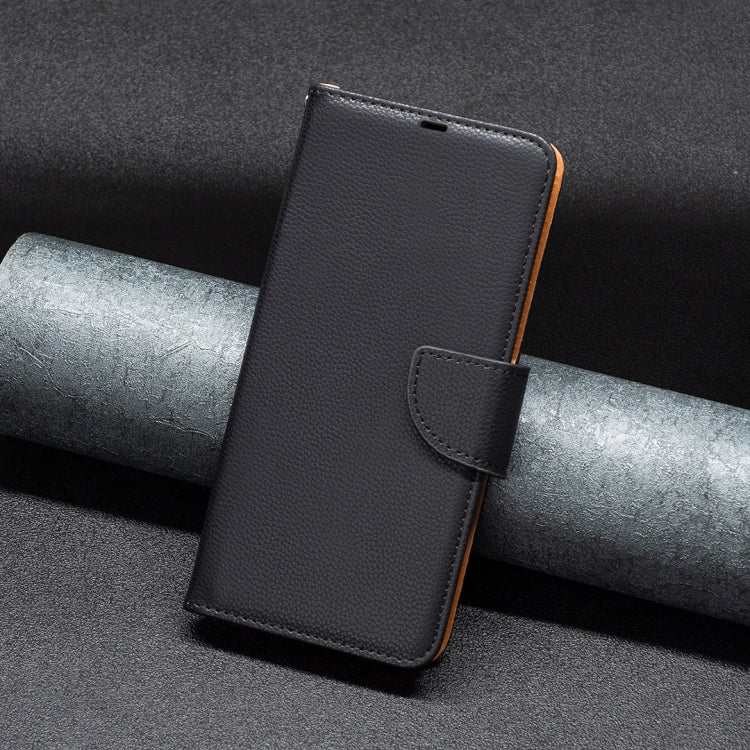 For iPhone 16 Litchi Texture Pure Color Flip Leather Phone Case(Black)