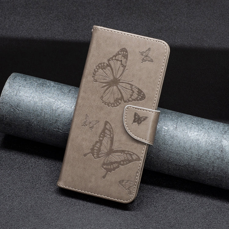 For iPhone 16 Pro Embossing Two Butterflies Pattern Leather Phone Case(Grey)
