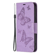 For iPhone 16 Embossing Two Butterflies Pattern Leather Phone Case(Purple)