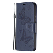 For iPhone 16 Embossing Two Butterflies Pattern Leather Phone Case(Blue)