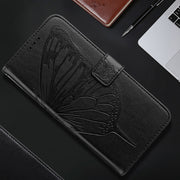 For iPhone 16 Pro Embossed Butterfly Leather Phone Case(Black)