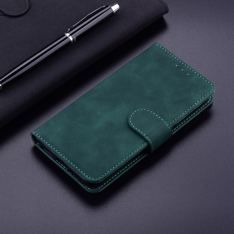 For iPhone 16e Skin Feel Pure Color Flip Leather Phone Case(Green)