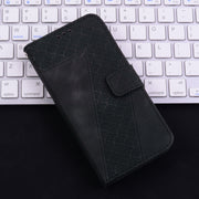 For iPhone 16 Seven-shaped Embossed Leather Phone Case(Black)