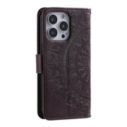 For iPhone 16 Pro Max Totem Flower Embossed Leather Phone Case(Brown)