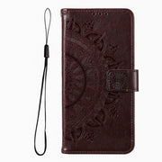 For iPhone 16 Pro Totem Flower Embossed Leather Phone Case(Brown)
