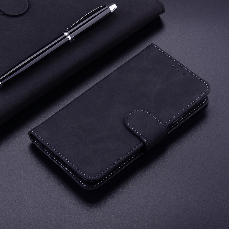 For Honor Magic6 Pro Skin Feel Pure Color Flip Leather Phone Case(Black)