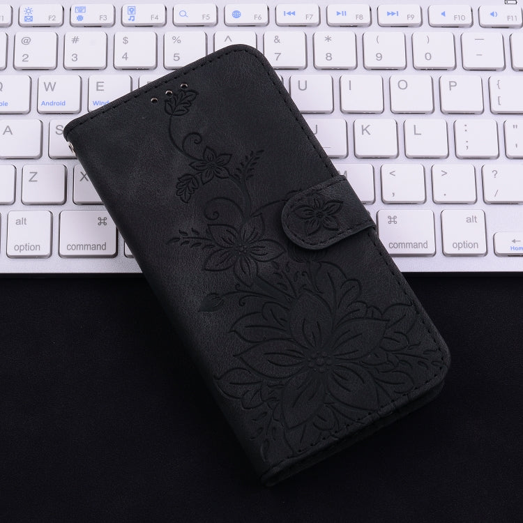 For iPhone 16e Lily Embossed Leather Phone Case(Black)