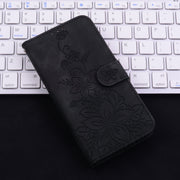 For iPhone 16e Lily Embossed Leather Phone Case(Black)