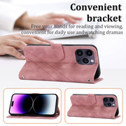 For iPhone 16 Pro Embossed Line Leather Phone Case with Lanyard(Pink)