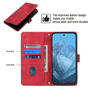For Google Pixel 9 / 9 Pro Skin-feel Embossed Leather Phone Case(Red)