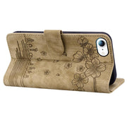 For iPhone 16e Cartoon Sakura Cat Embossed Leather Phone Case(Brown)