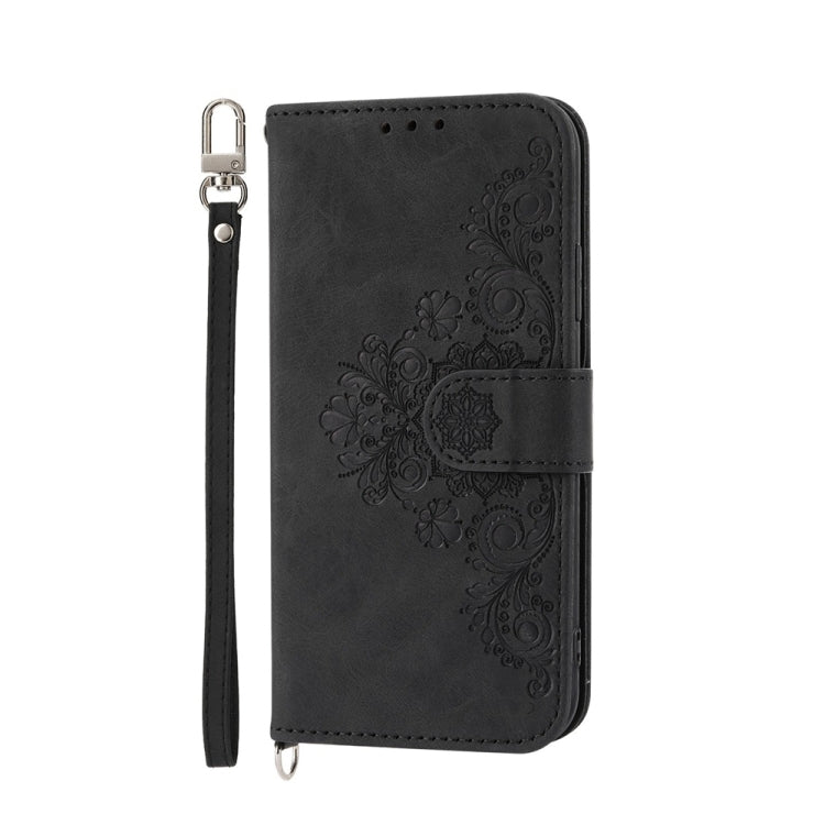 For iPhone 16e Skin-feel Flowers Embossed Wallet Leather Phone Case(Black)