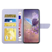 For Google Pixel 9 Skin Feel Butterfly Embossed Flip Leather Phone Case(Purple)