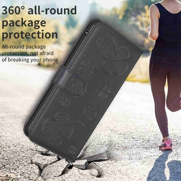For Xiaomi Redmi Note 12 4G Global Four-leaf Embossed Leather Phone Case(Black)