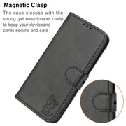 For Google Pixel 9 Pro Embossed Happy Cat Pattern Flip Leather Phone Case(Black)