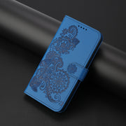 For Google Pixel 9 Pro Datura Flower Embossed Flip Leather Phone Case(Blue)