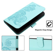 For Google Pixel 9 Pro Datura Flower Embossed Flip Leather Phone Case(Light blue)