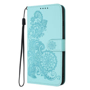 For Xiaomi Redmi K70 Datura Flower Embossed Flip Leather Phone Case(Light blue)