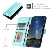 For Xiaomi Redmi K70 Datura Flower Embossed Flip Leather Phone Case(Light blue)