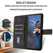 For iPhone 16 Triangle Solid Color Leather Phone Case(Black)