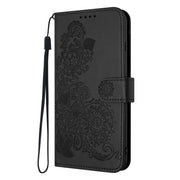 For iPhone 16e Datura Flower Embossed Flip Leather Phone Case(Black)