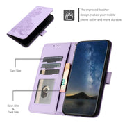 For iPhone 17 Air Datura Flower Embossed Flip Leather Phone Case(Purple)
