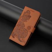For iPhone 17 Datura Flower Embossed Flip Leather Phone Case(Brown)
