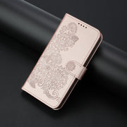 For iPhone 17 Datura Flower Embossed Flip Leather Phone Case(Rose Gold)