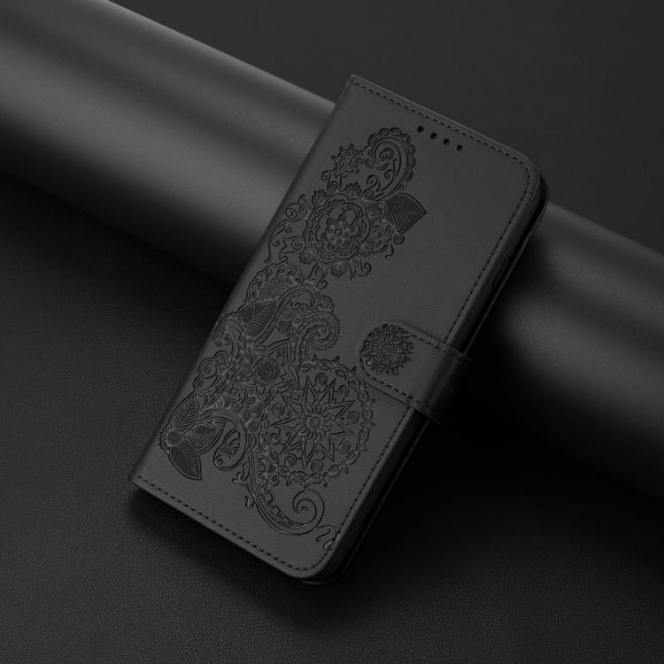 For iPhone 17 Pro Max Datura Flower Embossed Flip Leather Phone Case(Black)