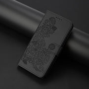 For iPhone 17 Pro Datura Flower Embossed Flip Leather Phone Case(Black)