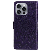 For iPhone 16 Pro Max Embossed Sunflower Pattern Flip Leather Phone Case(Purple)