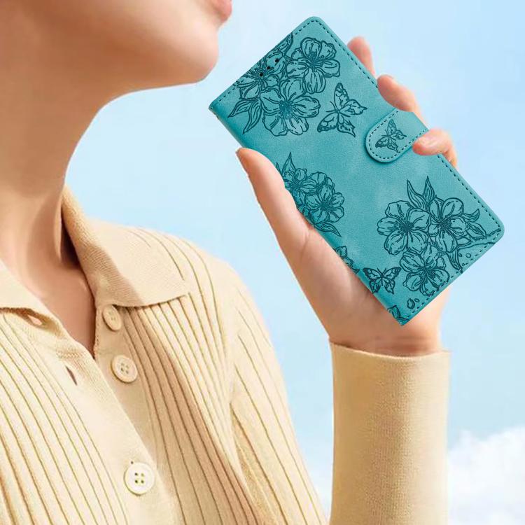 For iPhone 16e Cherry Blossom Butterfly Skin Feel Embossed PU Phone Case(Green)