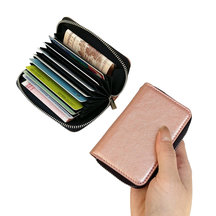 For iPhone 16 Solid Color Zipper 11-Card Slots Bag Phone Case with Lanyard(Rose Gold)