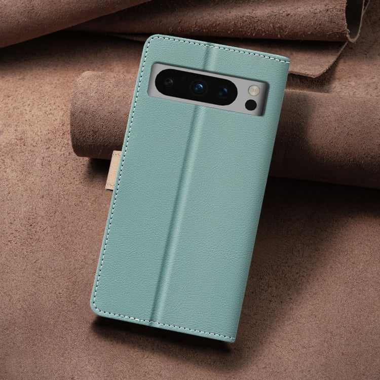For Google Pixel 9 Pro Color Matching RFID Anti-theft Leather Phone Case(Green)