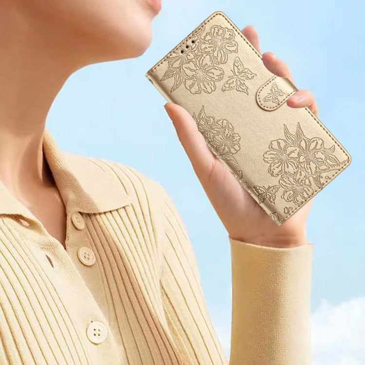For Samsung Galaxy S25+ 5G Cherry Blossom Butterfly Skin Feel Embossed PU Phone Case(Gold)
