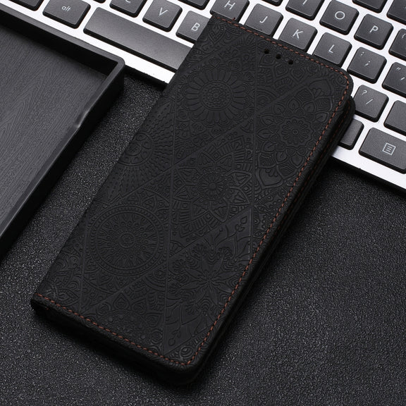 For Google Pixel 9 Pro XL Ethnic Embossed Adsorption Leather Phone Case(Black)