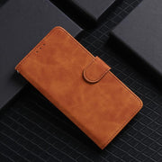 For iPhone 16e Skin Feel Magnetic Flip Leather Phone Case(Brown)