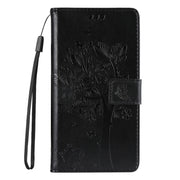 For Samsung Galaxy S25 / S24 5G Tree & Cat Embossed Pattern Flip Leather Phone Case(Black)