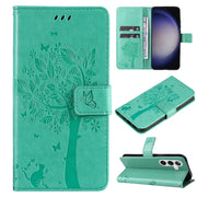 For Samsung Galaxy S25+ / S24+ 5G Tree & Cat Embossed Pattern Flip Leather Phone Case(Green)