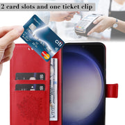 For Samsung Galaxy S25+ / S24+ 5G Tree & Cat Embossed Pattern Flip Leather Phone Case(Red)