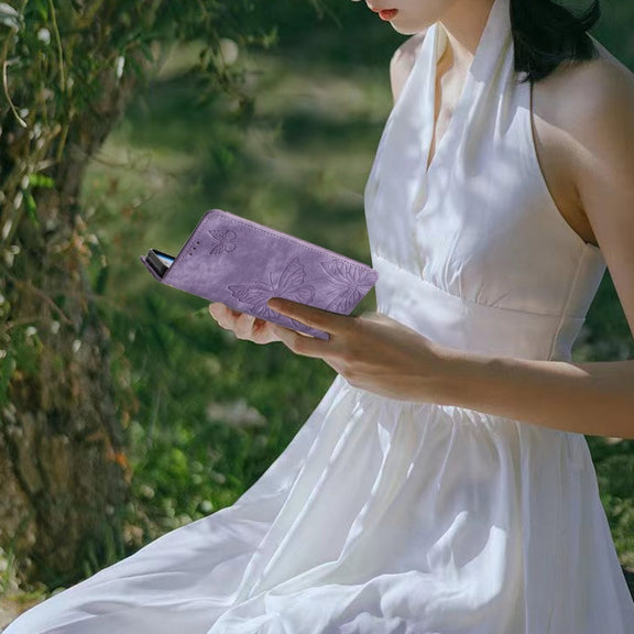For Samsung Galaxy S25 5G Skin-feel Embossed Butterfly Leather Phone Case(Purple)